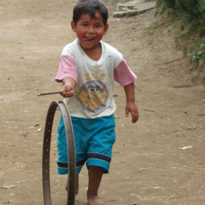 Boy Rolling a wheel